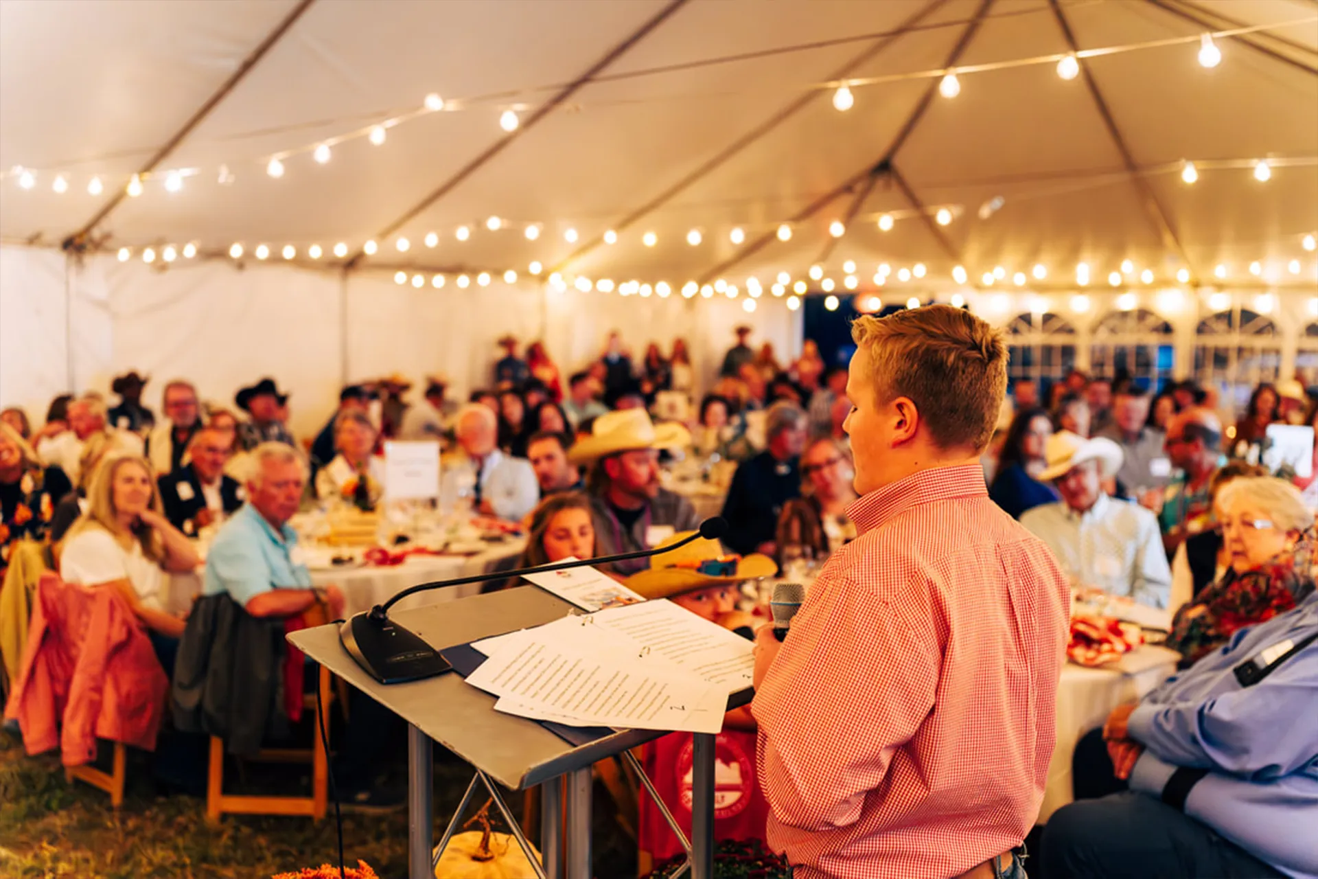 Colorado Agricultural Leadership Foundation Annual Legend Dinner speaker under tented event lighting